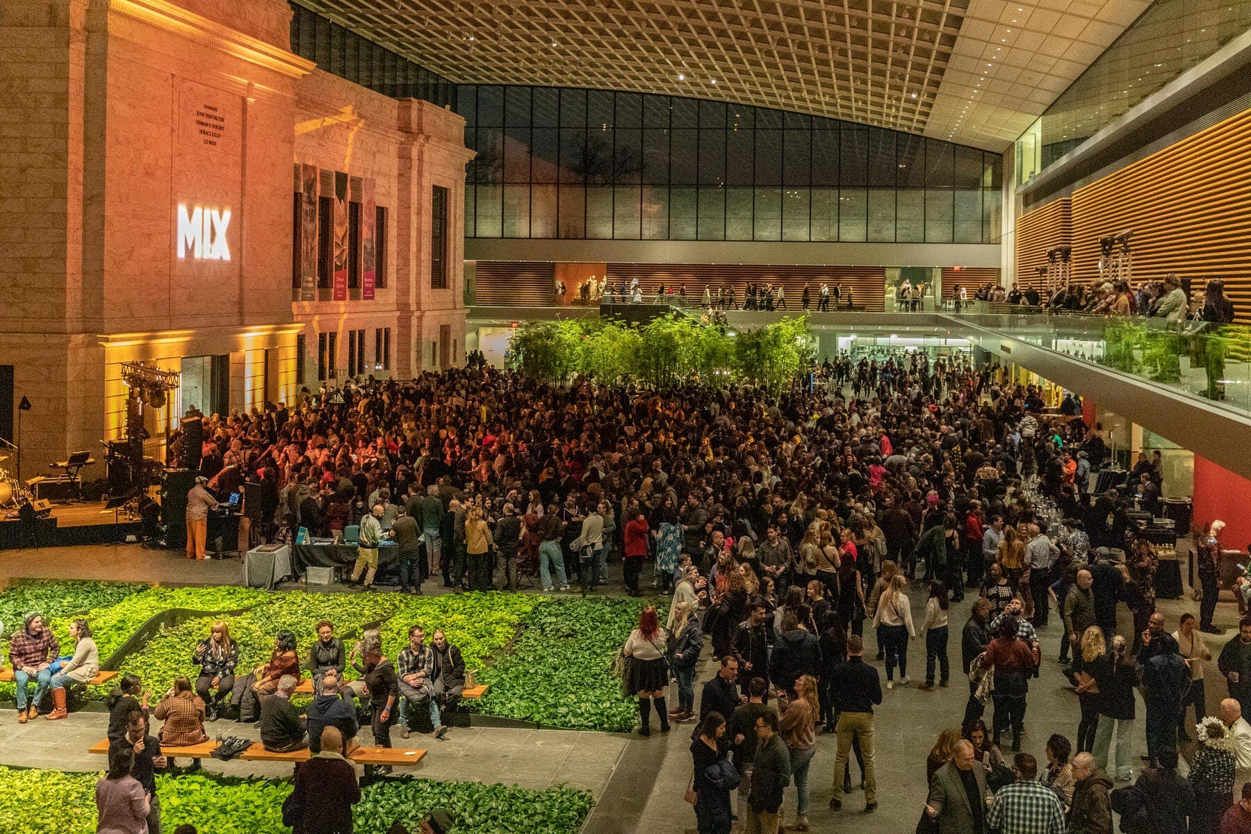 a large group of people in a hall