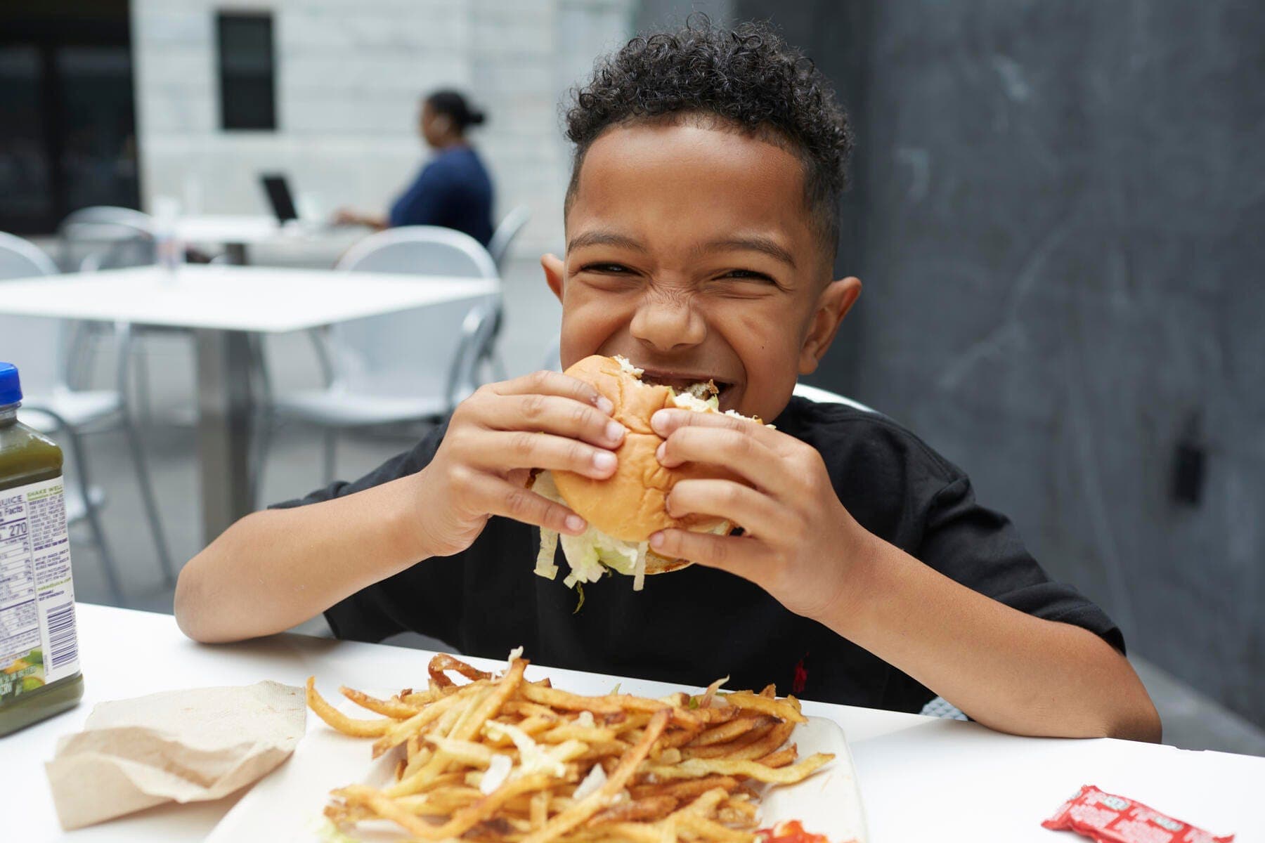 a person eating a sandwich