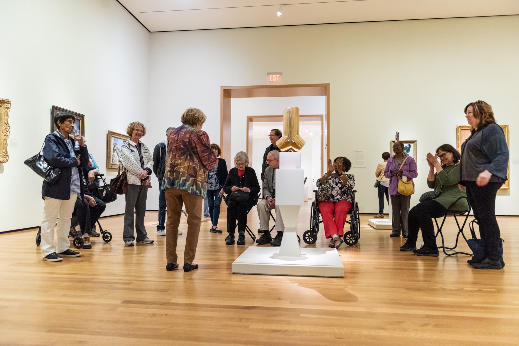 A group of older visitors enjoying a tour