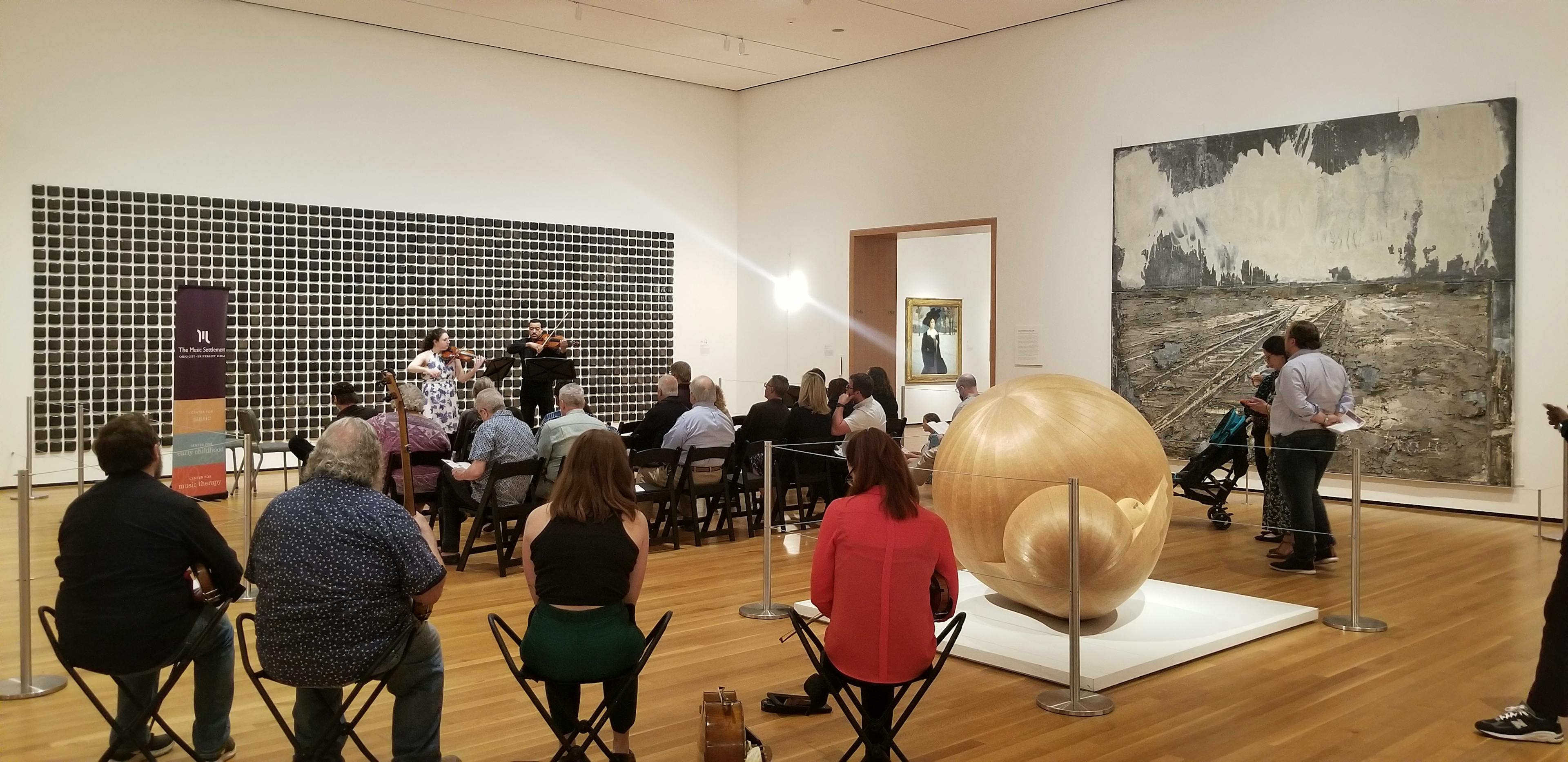 Faculty from The Music Settlement performing in gallery