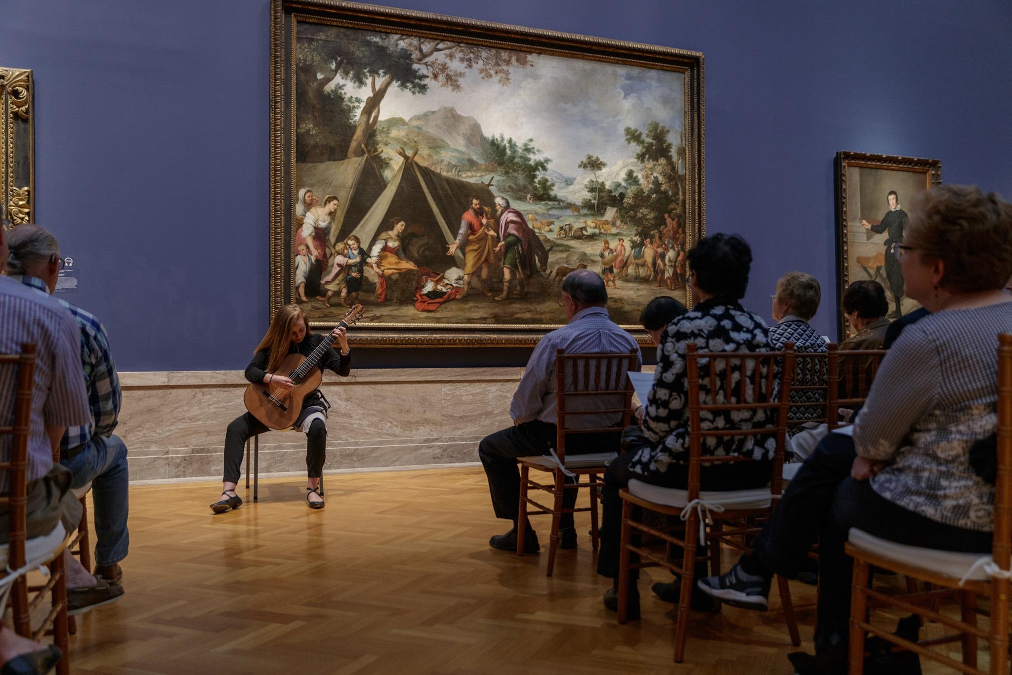 CIM guitar student performing in gallery