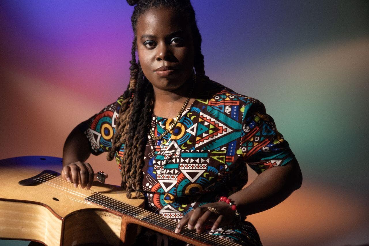 a person playing a guitar
