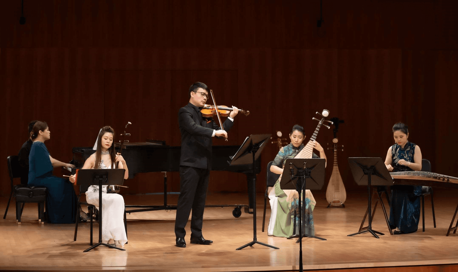 a group of people playing instruments