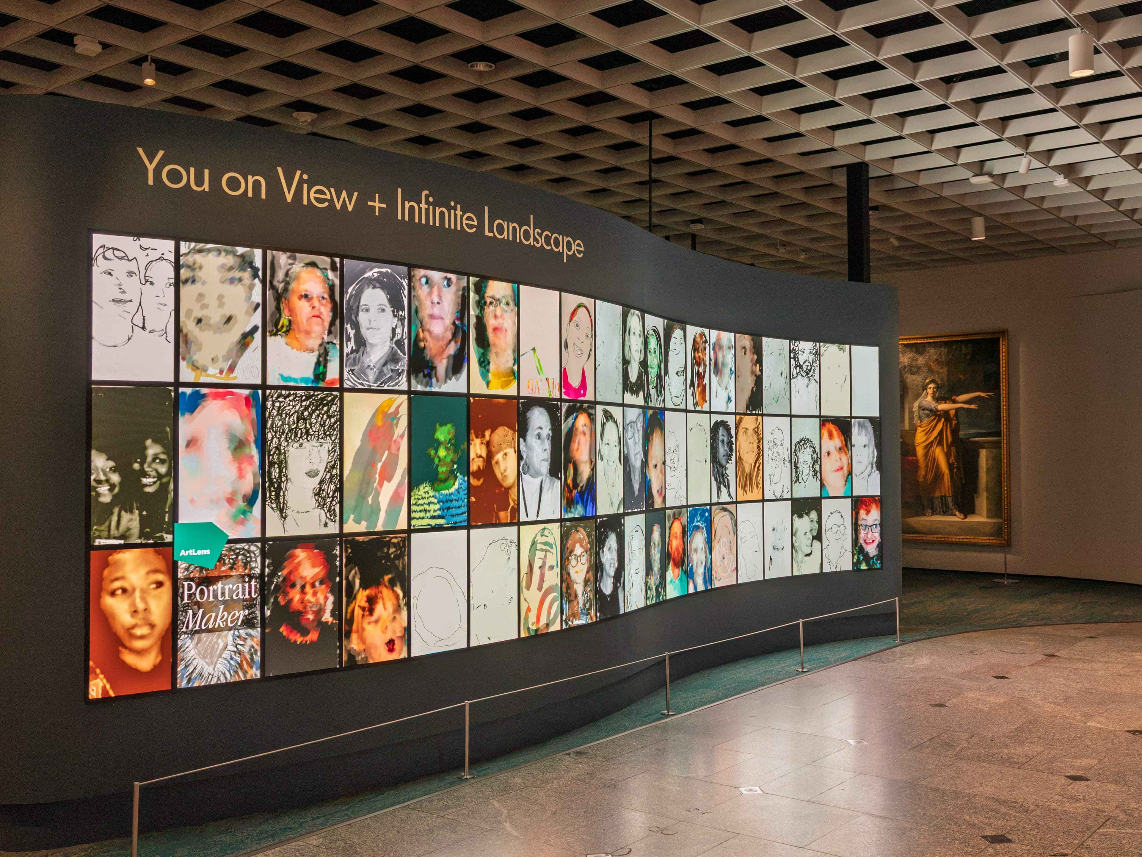 A horizontally long wall shows a grid of the latest visitor creations from the Portrait Maker interactive.